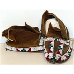 Sioux Indian Child's Beaded Moccasins, circa 1920. 6" long. Estimate $300-$400.…