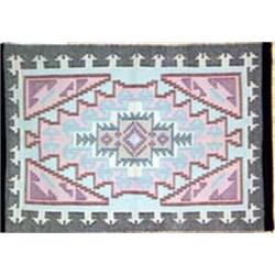 Navajo Outline Weave Rug by Louise Nez. 54.5" x 36.5". Estimate $750-$1,000.…