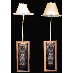 Ace Powell (1912-1978). Bronze bear wall sconce Lamps with rawhide shades. 25" tall with shades. …