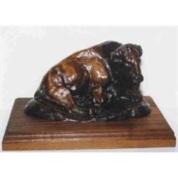 C.M. Russell (1864-1926). Bronze sculpture.  Lone Buffalo.  #98/110. 4  x 7 . Estimate $500-$750.…