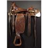 Image 1 : Olsen-Nolte (San Francisco, CA). Hand tooled & sterling silver saddle. Estimate $3,000-$4,000.…