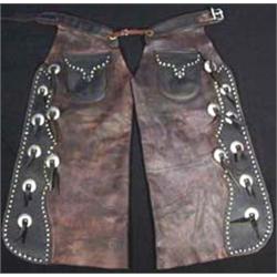 Heiser Chaps. With studs & conchos. Estimate $700-$900.…