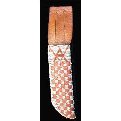 Beaded Knife Scabbard. 8" long. Estimate $200-$300.…