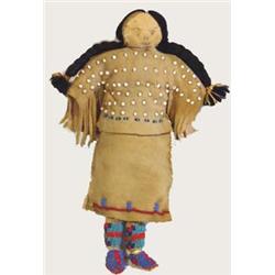 Northern Plains Beaded Hide Indian Doll circa 1920's. 11  tall. Estimate $400-$500.…