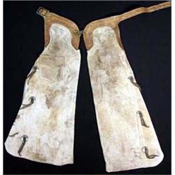 Cowboy Made Chaps with conchos & tooled belt. Show cowboy use. Estimate $300-$400.…