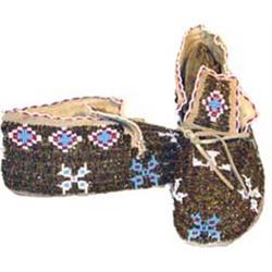 Beaded Moccasins. 10" long. Estimate $300-$400.…