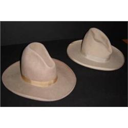 Pair of Cowboy Hats. Estimate $350-$450.…