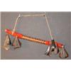 Image 1 : Dew Claw Rattle. Decorated with early red shroud & fiber wrapping. Late 19th century. Displayed i…