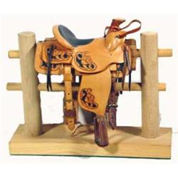 Glen Hojem Miniature Bob Crosby Roper Saddle with stand. Estimate $75-$125…