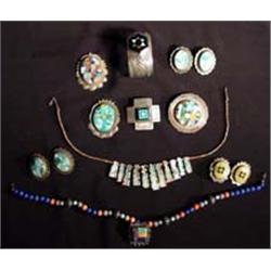 Lot of Mosaic jewelry consisting of: Silver brooch with large marbled turquoise oval design, Silv…