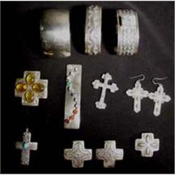 Jewelry lot consisting of: 2 silver cross slip on pins, 2 silver cross brooch/slip on pins, 2 Sil…