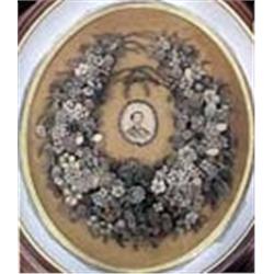 Civil War Era Hair Wreath. Framed in period frame. 20.5  x 17. Estimate $2,000-$3,000.…