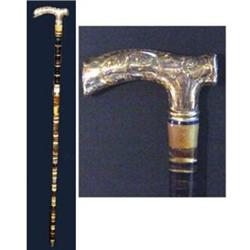 19th Century Cane. Constructed from rings of horn with gold head. Inscribed with name & dated 189…