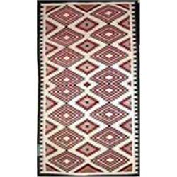 Navajo Indian Eye Dazzler Rug. 76" x 130". Estimate $5,000-$7,500.…