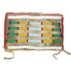 Crow Indian Buffalo Hide Sewing Bag, circa 1880's. Fine condition. 4.5" x 7". Estimate $1200-1500…