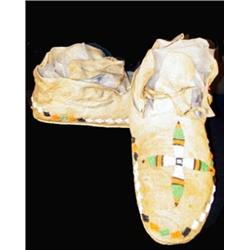 Beaded Moccasins. 10.5" long. Estimate $750-$1,000.…