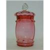 Image 1 : A RUBY GLASS COVERED JAR, clear finial height, and a spare cover (2)  £30-40...