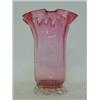 Image 1 : A RUBY GLASS CELERY VASE, wavy rim, clear pincered foot, height 19cm   £30-40...