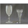 Image 1 : A WATER GOBLET, c.1890, etched bowl on facet stem, and a wine flute, c.1825, engraved heraldic cr...