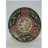 Image 1 : AN ORIENTAL IMARI DISH, 19th Century, central coiled dragon within an enamel and gilt border of e...