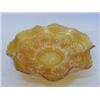 Image 1 : A MARIGOLD CARNIVAL GLASS DISH, moulded Peacock and Grape pattern, diameter 22cm  £30-50...