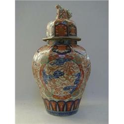 A LARGE ORIENTAL IMARI BALUSTER VASE, 19th Century, octagonal section, prunus branches, exotic bi...