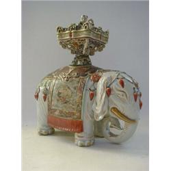 A JAPANESE ELEPHANT FIGURE, 19th Century, Chinaman sitting in a galleried basket on top, decorate...