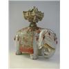 Image 1 : A JAPANESE ELEPHANT FIGURE, 19th Century, Chinaman sitting in a galleried basket on top, decorate...