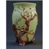 Image 1 : A CLARICE CLIFF VASE, moulded blossom on gnarled branches on a pale yellow ground, height 18cm  £...
