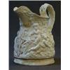 Image 1 : A RELIEF MOULDED JUG, mid 19th Century, cherubs at play, gilt, 'E.A' monogram, height 18cm  £30-4...