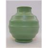 Image 1 : KEITH MURRAY FOR WEDGWOOD, a horizontal fluted vase, matt green glaze, facsimilie signature and i...