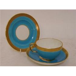 THREE MINTONS CABINET CUPS, and two saucers, late 19th Century, raised gilding containing a turqu...