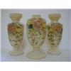 Image 1 : A GARNITURE OF THREE IVORY OPALINE VASES, c.1880, over-enamel floral decoration, height of talles...