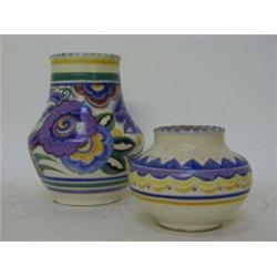A CARTER STABLER ADAMS LOW VASE, No.353, height 10cm and a Poole baluster vase, No.443 (s.d.), he...