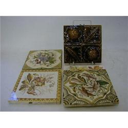 A MAW & CO ART POTTERY TILE, moulded vegetables, chocolate glaze, with four transfer printed tile...