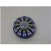 Image 1 : A MILLEFIORE GLASS PAPERWEIGHT, star shaped spiral canes on indigo ground, height 6cm, diameter 7...