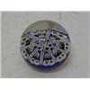 Image 1 : A MILLEFIORE GLASS PAPERWEIGHT, pink and blue daisies on indigo ground, height 3cm, diameter 6cm ...