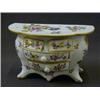 Image 1 : A HOCHST TRINKET BOX, in the form of a bombe commode, florally decorated, height 14cm (s.d.) £120...
