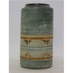 A TROIKA CYLINDER VASE, signed 'M.P', height 20cm  £70-90...