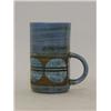 Image 1 : A TROIKA BLUE MUG, signed 'L.T', height 11cm  £50-60...
