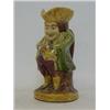 Image 1 : A SEATED TOBY JUG, 19th Century, wearing a yellow hat and green jacket, height 19cm, (restoration...