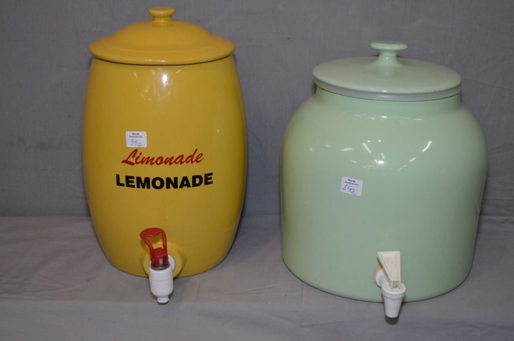 Two glazed stoneware Lemonade dispensers with spigots
