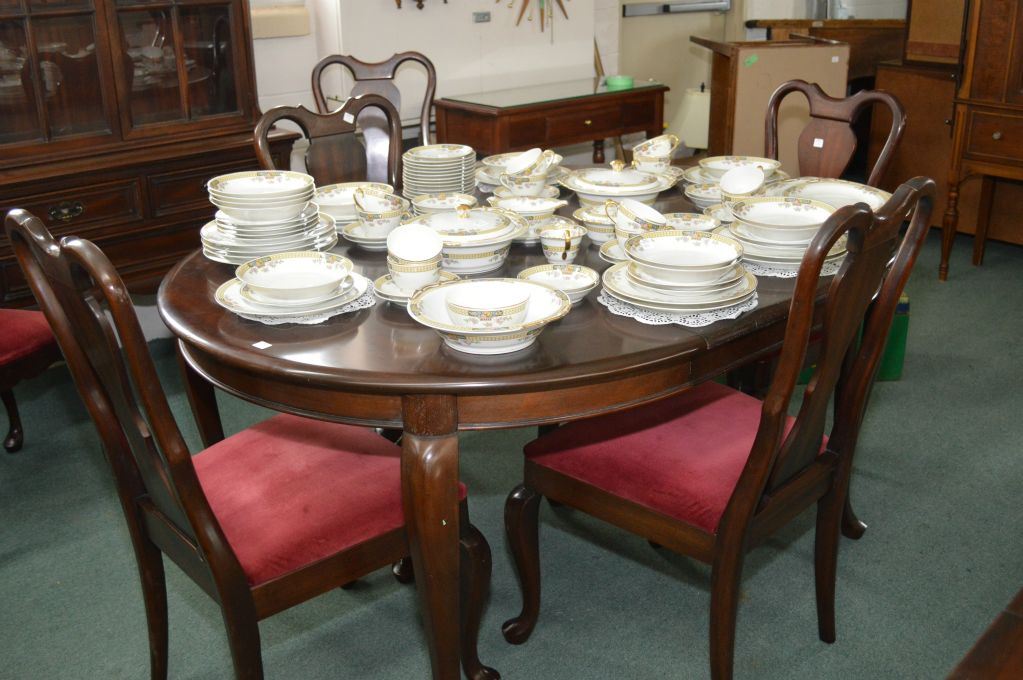 Solid mahogany Gibbard 44" round dining table with three insert leaf and six dining chairs