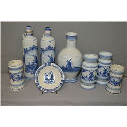Selection of handpainted Delft pottery including bottles, vases, bowl and tankards