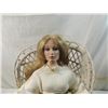 Image 2 : COLLECTORS PORCELAIN DOLL IN WICKER CHAIR