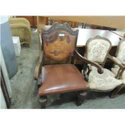 ANTIQUE LEATHER ARM CHAIR