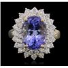 Image 1 : 14KT Yellow Gold 4.79ct Tanzanite and Diamond Ring