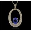Image 1 : 14KT Yellow Gold 3.83ct Tanzanite and Diamond Pendant With Chain
