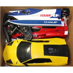 BOX W/ 2 REMOTE CONTROL CARS -