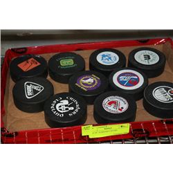 LOT OF  10 HOCKEY PUCKS